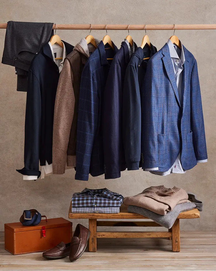 Assortment of jackets and blazers hanging